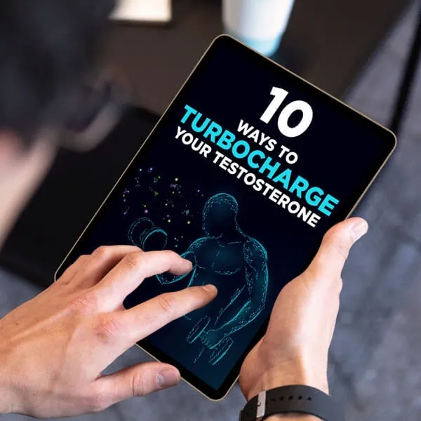 Hands on a tablet that shows the e-book cover 10 Ways To Turbocharge Your Testosterone